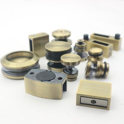 سعر جيد نظام باب منزلق بدون إطار من الفولاذ المقاوم للصدأ SS304 مع بكرات ذهبية مصقولة وتصميم بدون إطار الانترنت